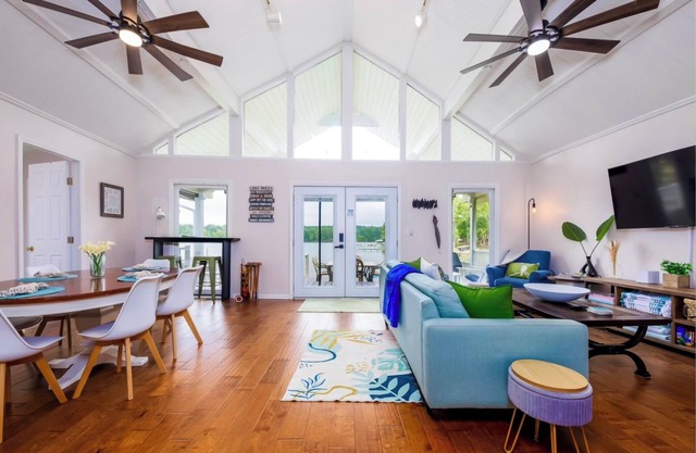 Stylish 4 bed, 3 full bath Lakefront, Fenced Property & Over-the-Top Amenities