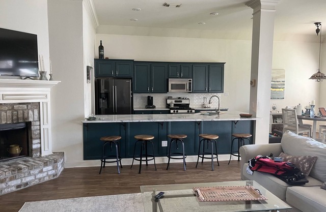 You found it! Great 3/2 in heart of Mandeville. Bring the family and the pups!