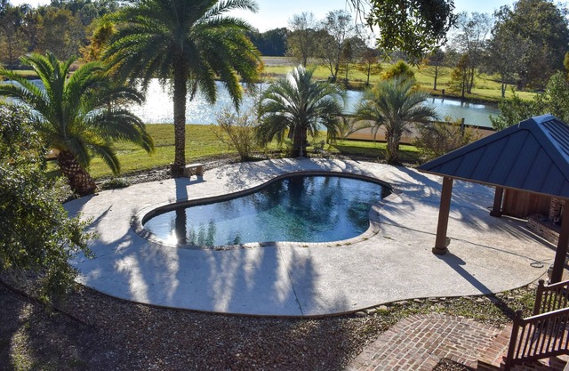 Youngsville Retreat- pool, private pond, outdoor fireplace