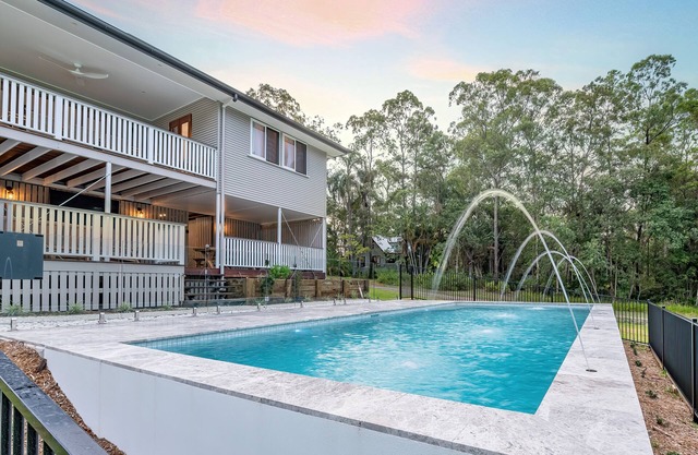 Your luxury retreat, tucked beneath the Glass House Mountains.