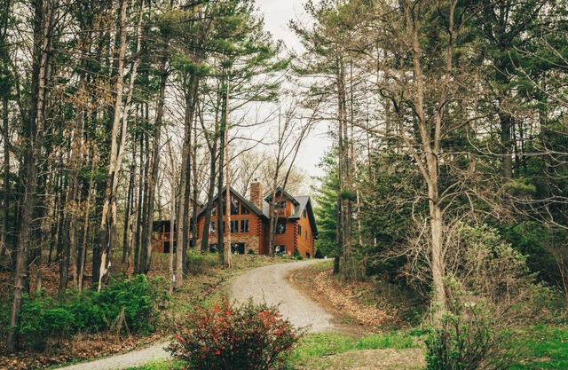 You’ve Found Paradise With this Spacious Log Cabin on Keuka Lake -