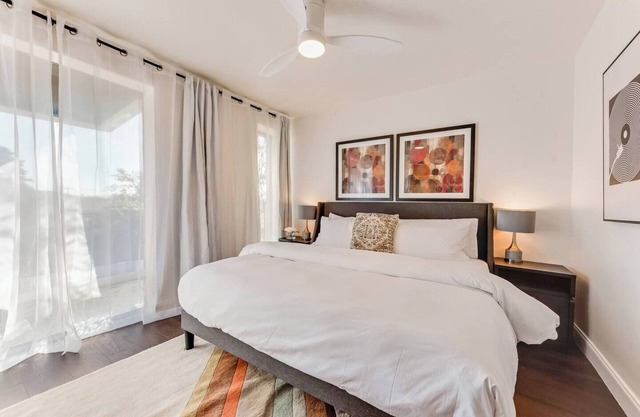 Zen 1BR + Loft with dual king beds, resort-style pool, and luxury amenities.