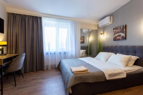 Petrovskoye Apartamento | Сучасна студія в центрі - Харківська набережна 3-8