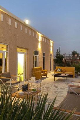 Falaj al Moalla Chalet De Esquí | مزرعه فلج المعلا