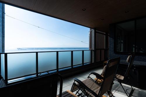 Nishi Ward Apartamento | みらいステイKAWACHI サウナspaや温泉付き-絶景オーシャンビューを満喫