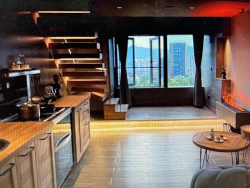 Chongqing Apartamento | 哲帆民宿 大竹林江与城loft复式智能房店