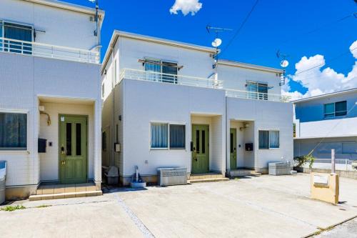 Maeda Apartamento | 青の洞窟まで車で3分の恩納海彩は完全プライベートの一棟貸