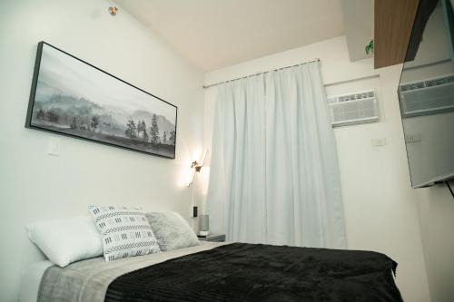 Butuan Apartamento | 2-Bedroom Elegant Condo - Butuan Retreat