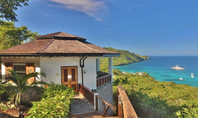 Friendship Bay Cabaña | 5 * HIBISCOS Cottage * Impresionantes vistas-increíble INFINITY POOL-Amazing Island