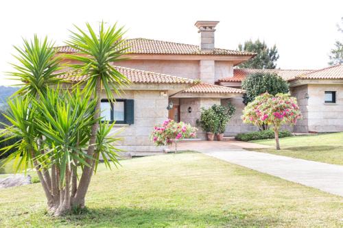 Carracido Villa | A Casa de Lamas