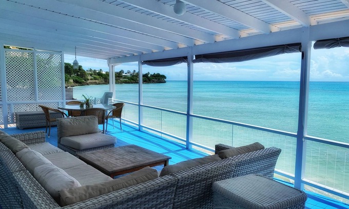Atlantic Shores Casa | ¡El hogar de un surfista lejos de casa! Suave alrededor de los bordes, acogedor y playero