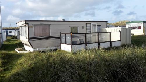 Nes Casa | AMELAND-Nes-Duinoord: Stacaravan (chalet) + fietsen direct aan zee!