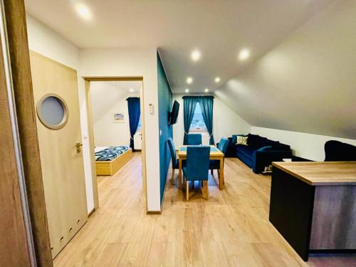 Grzybowo Apartamento | Apartament turkusowy