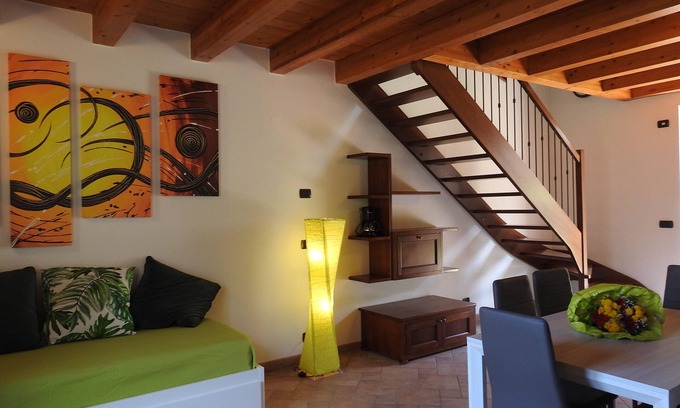 Malcesine Apartamento | Apartamento con vista al balcón, piscina climatizada, aire acondicionado, aparcamiento