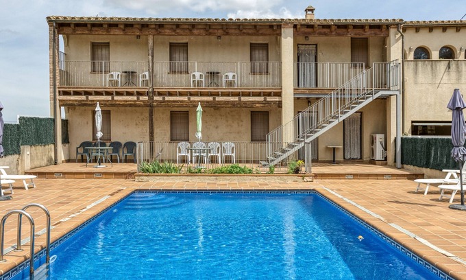 Torroella de Fluvia Apartamento | Apartamento 'Cal Ferrer 3 -paller' con piscina compartida, Wi-Fi y aire acondicionado