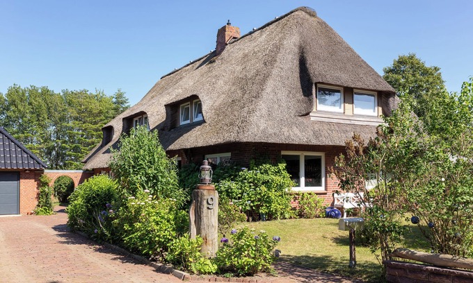 Nebel Apartamento | Apartamento en casa con techo de paja en Nebel en la isla Amrum - WLAN, TV, terrac