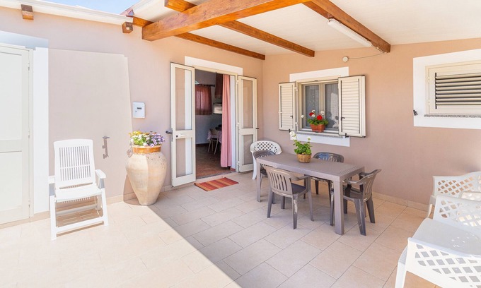 Granelli Apartamento | Apartamento 'Nonna Rosa' con terraza privada, jardín compartido y aire acondicionado