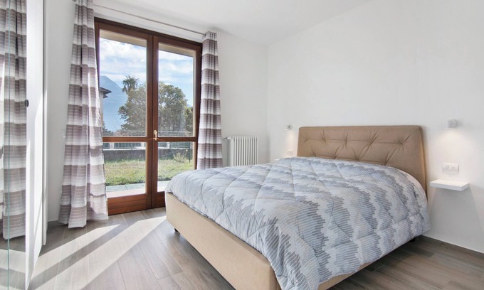 Consiglio di Rumo Apartamento | Apartamento "Orange Corner - Gravedona" con vistas a la montaña, terraza y Wi-Fi