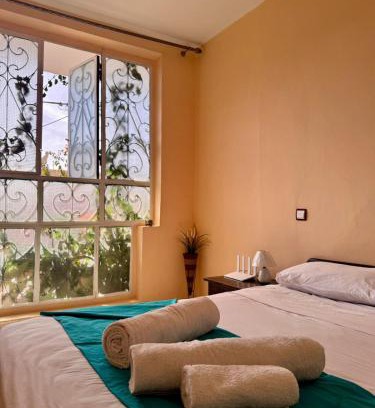 Bensergao Apartamento | APT à 10 min de la Plage, du Centre et du Palais - WIFI Haut Débit et Parking Gratuit