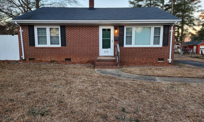 Roanoke Rapids Casa | Beautiful Brick Home in Walking Distance to Lake Beach Area
