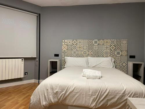 Distrito Oeste Casa | Belmonte Rooms - check in Hotel a 650 metros