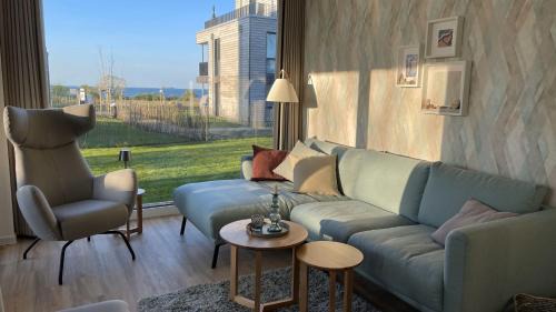 Marienleuchte Apartamento | BeltBlick 25 - Marienlücht - Exklusive Ferienwohnung mit Garten und Meerblick