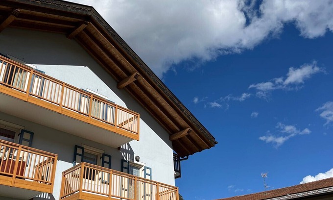 Ziano di Fiemme Apartamento | Bright and comfortable apartment with mountain views.