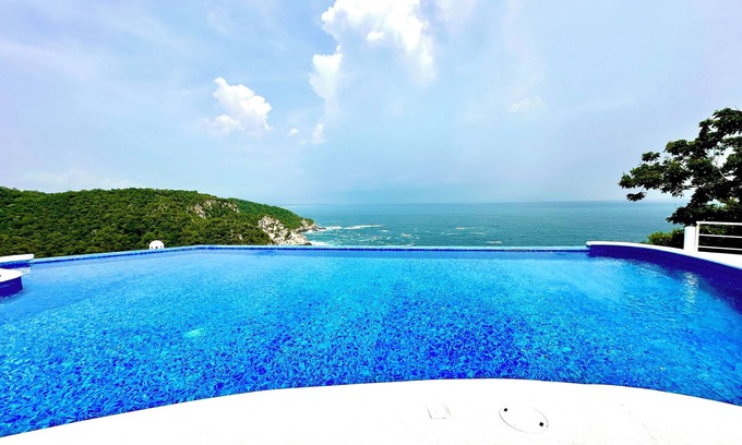 Puerto Ángel Casa | Exclusivo bungalow alberca nueva con increíbles vistas panorámicas al pacifico.