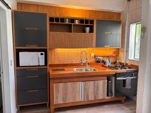 Pontal da Cruz Apartamento | Casa de praia com ar condicionado.