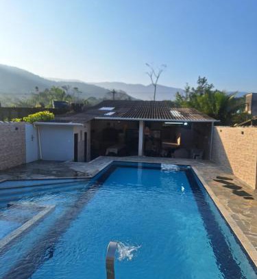 Caiubura Casa | Casa em Bertioga com piscina aquecida