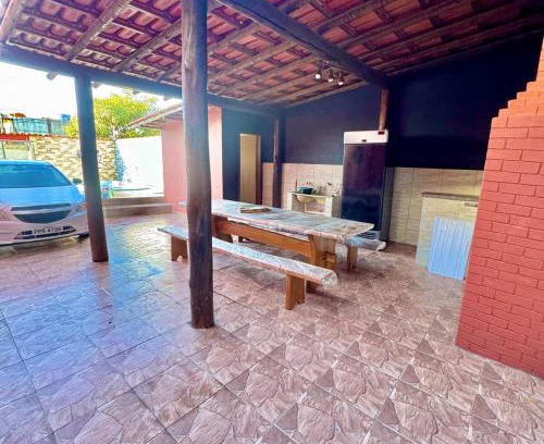 Pontal de Santa Monica Casa | Casa Espaçosa com Piscina e Churrasqueira Ideal para Família e Amigos