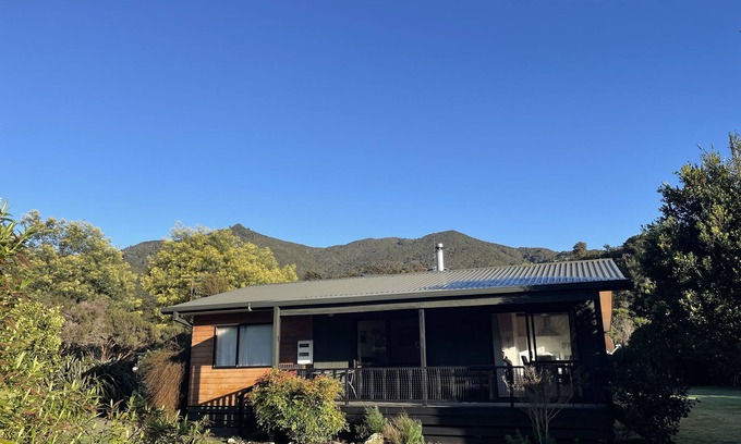 Okiwi Bay Casa | Catseye Cottage - Pesca fantástica en este maravilloso lugar.