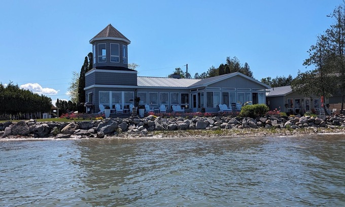 Chippewa County Cabaña | Charming cottage with amazing views St Mary's River in De TourVillage