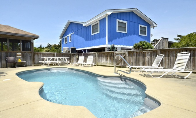 Salvo Cabaña | Propiedad de 5 estrellas Encantadora casa junto a la playa, piscina y spa; ubicado en una tranquila calle sin salida