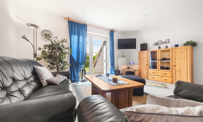 Wangerland Casa | Charming vacation home "Lütte Uttied": Your cozy retreat on the North Sea