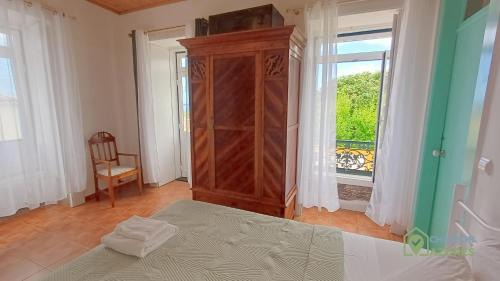 Angra do Heroismo Casa | Charmosa casa de campo vista mar e jardim privado