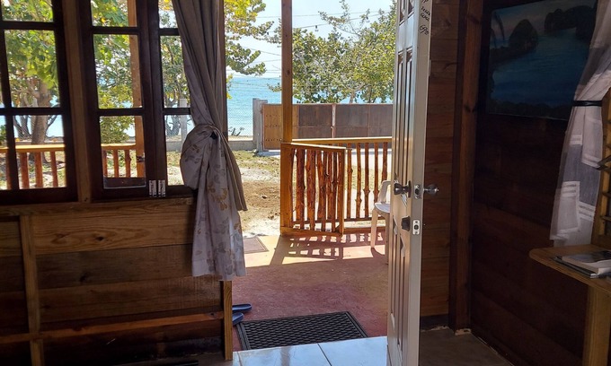 Orange Bay Cabina | Converted Storeroom Cabin by the Beach