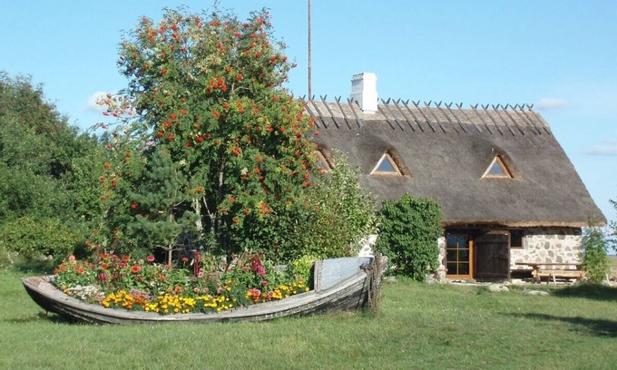 Haeska Cabaña | Cosy coast front house with spectacular sea view, fire place and sauna