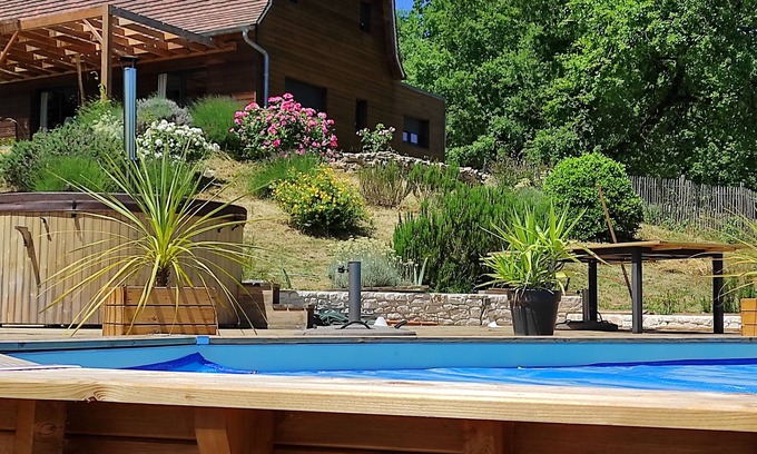 Betaille Casa | Dordogne Valley Lot timber-frame house set in greenery.