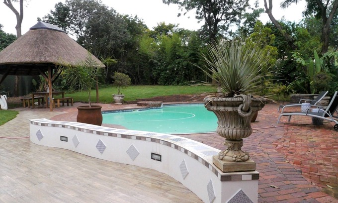 Greater Johannesburg Metropolitan Area Cabina | Douglas Lodge: el lugar tranquilo donde alojarse para relajarse o hacer negocios