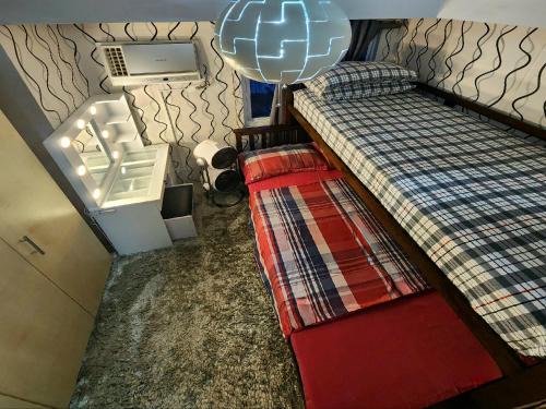 Santo Cristo Apartamento | Elegant Studio at Grass Residences 1-5 persons only, Quezon City