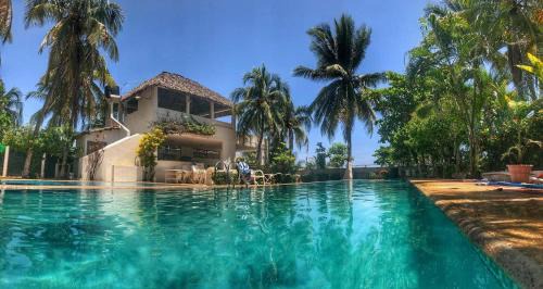 Puerto Arista Casa | Experiencia en la playa para 32 personas