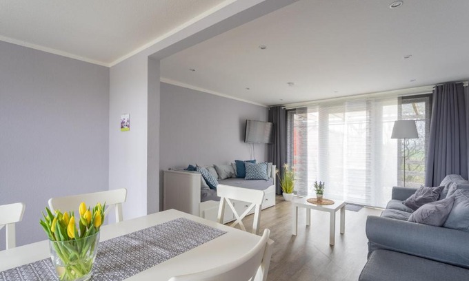 Janneby Apartamento | Ferienhaus Carstensen - gemütlich und rollstuhlfreundlich eingerichtetes Ferienhaus mit Terrasse