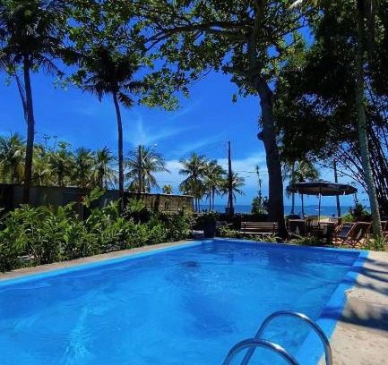 Guaiuba Hotel | Frente ao Mar - Suites com Piscina Aquecida, SPA Privativo, Vista ao Mar ou Montanha, com Estacionamento- Raizes do Mar ECO Hotel