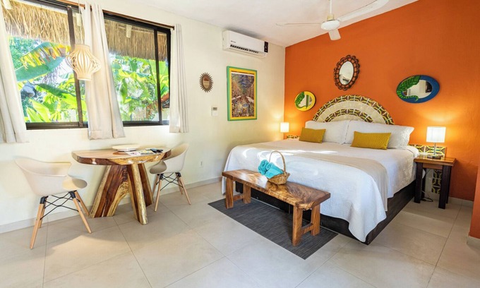 Isla Mujeres Cabaña | CASA DE HUÉSPEDES EN EL JARDÍN DE UNA VILLA FRENTE AL MAR MEXICANO CON PISCINA CLIMATIZADA