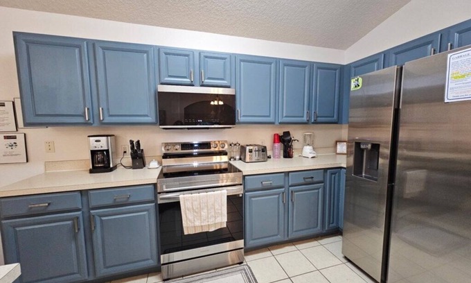 Legacy Park Villa | Gated 4 bed with Pool and Spa close to Disney