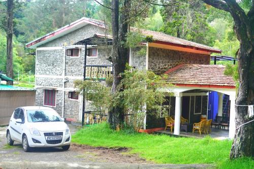 Kodaikanal Casa | Green lake view resort cottage