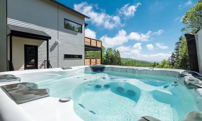 Saint-Joseph-de-la-Rive Chalet De Esquí | Hôtel à la maison - Le Visionnaire, spa et vue
