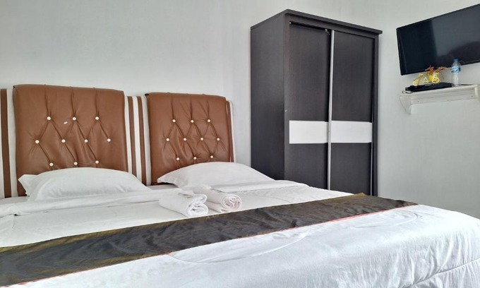 Saringan Hotel | Harisha Homestay Sawah Lunto Syariah Redpartner