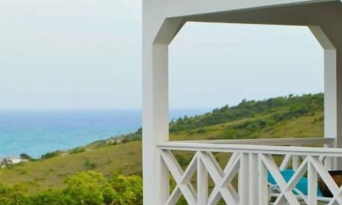 Freetown Cabaña | Hilltop Cottage w/ breathtaking view of Atlantic Ocean.